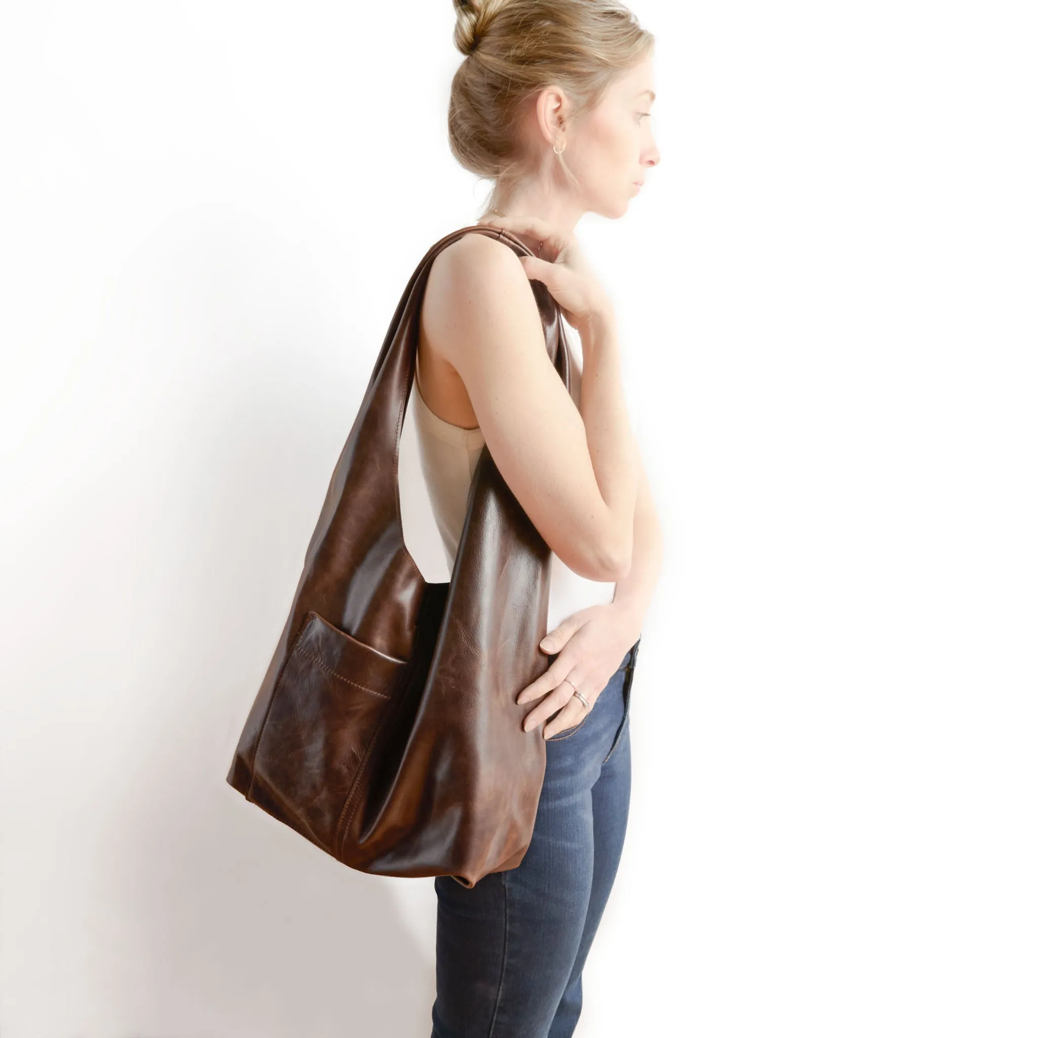 candid sling | outer pockets | large